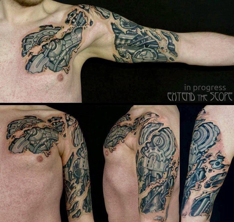 男生手臂上帅气的3d破皮机械纹身图片 3d破皮机械纹身