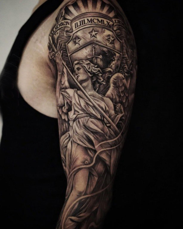 男生手臂上黑灰纹身人物肖像纹身图片 人物肖像纹身
