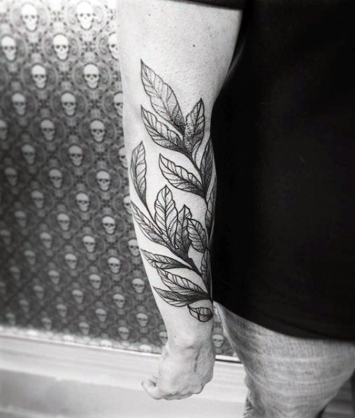 手臂简单的黑白树叶植物纹身图案